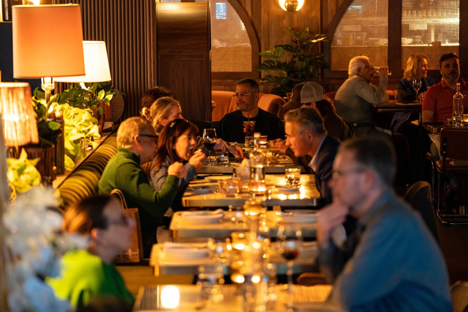 Guests at candlelit tables in the Mileta dining room