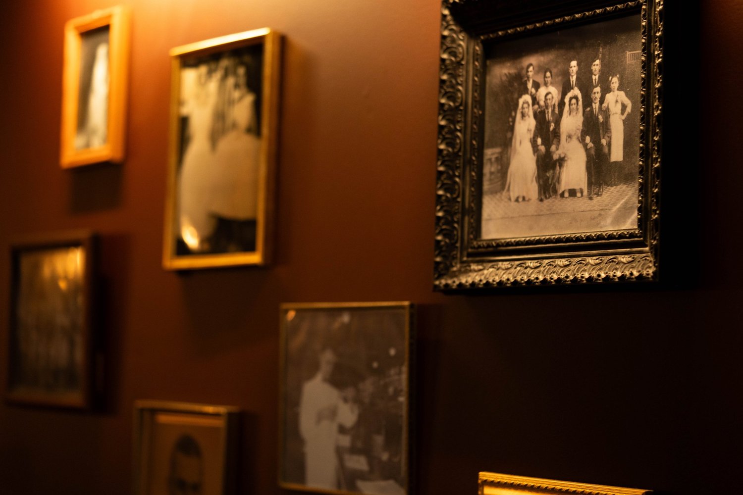 Family photos on the wall of the Rose Room